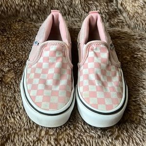 Slip on checkered Vans.